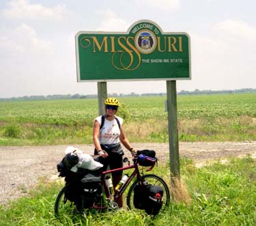 Kathy at the Missouri state sign
